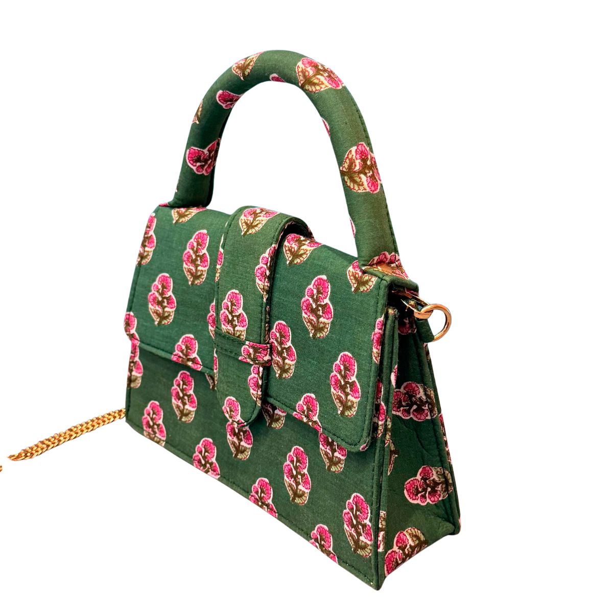 A structured green handbag with a pink and gold floral pattern, featuring a top handle, flap closure, and a gold chain strap, shown on a plain white background.