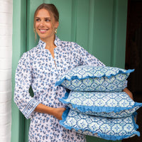 Faro blockprint square cushions with a ruffle edge.